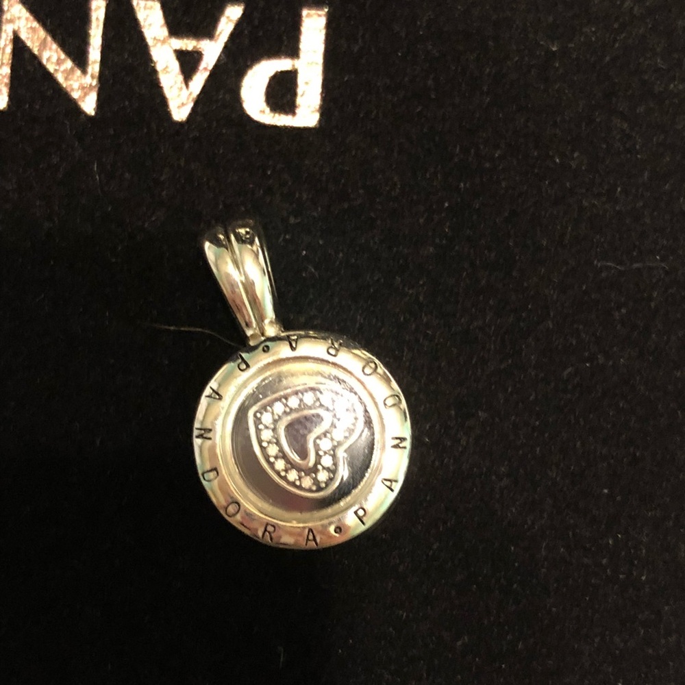 Multiple Pandora charms.